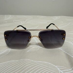 Cartier Gold Frame Sunglasses with Black Gradient Lenses